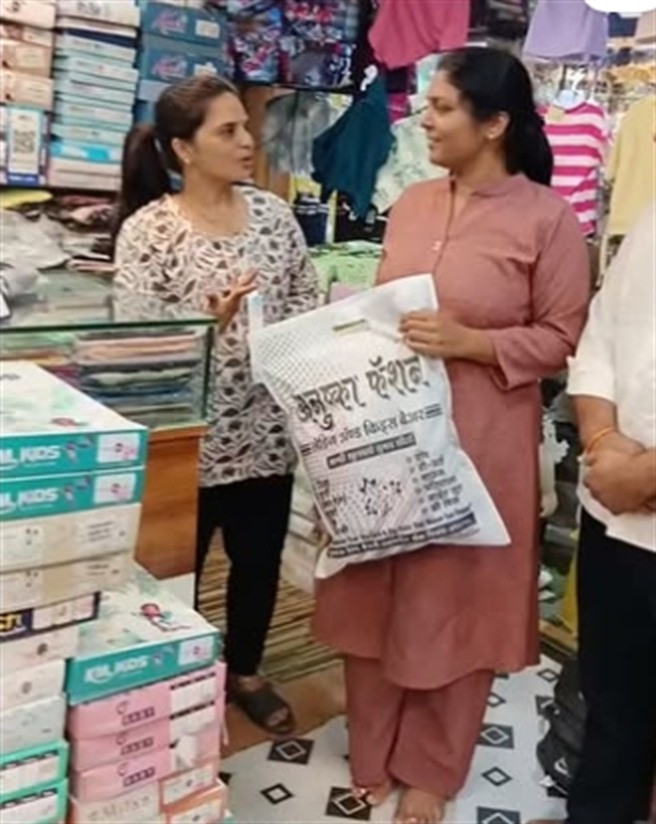 Happy customers with their Anushka Fashion bags at the Shirur store